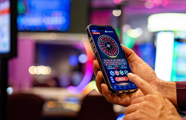 Mobile phone displaying live blackjack table interface